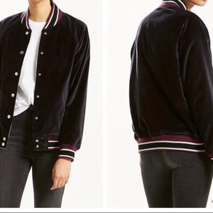 A reversible bomber jacket.